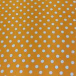Dacron estampado naranja puntos blancos